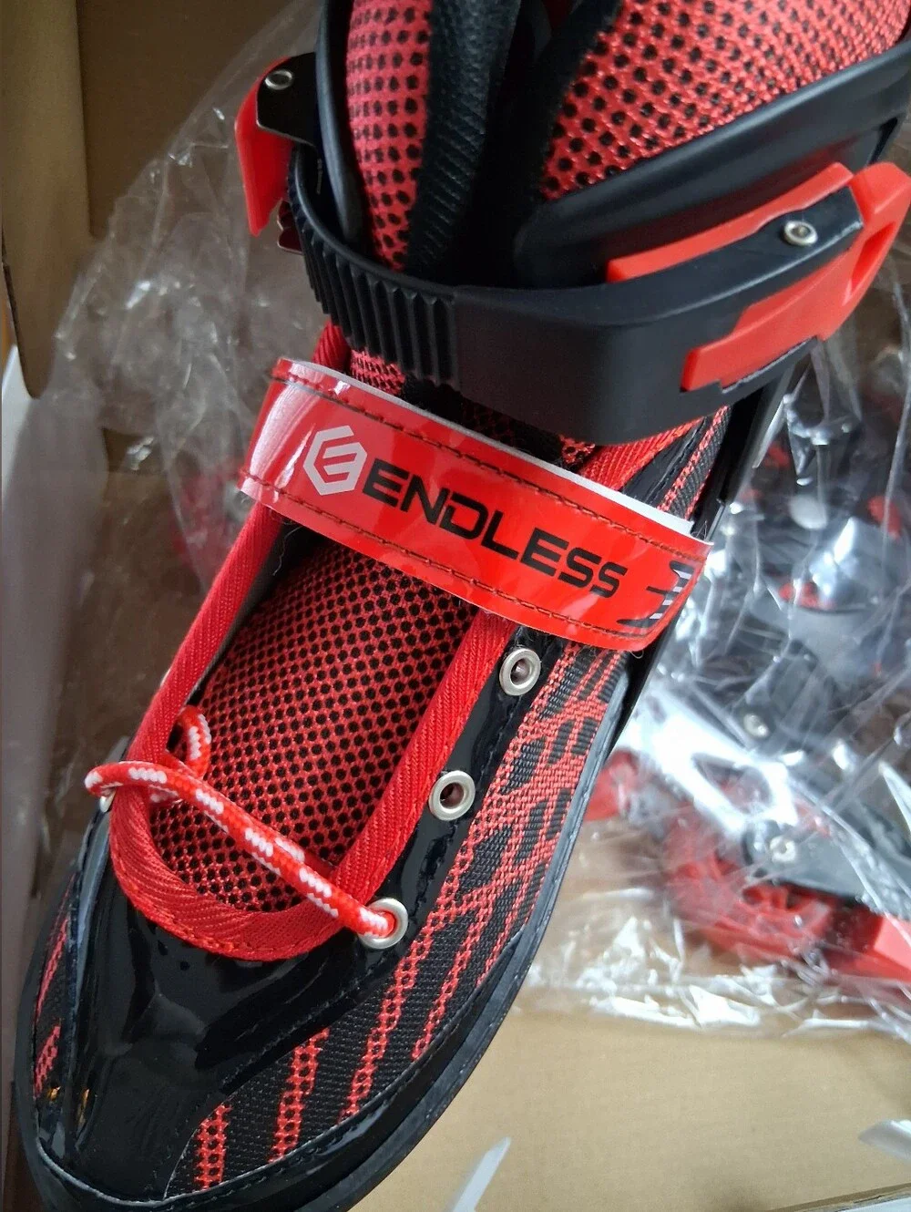 NIB-Youth Red and Black Adjustable Inline Roller Skates